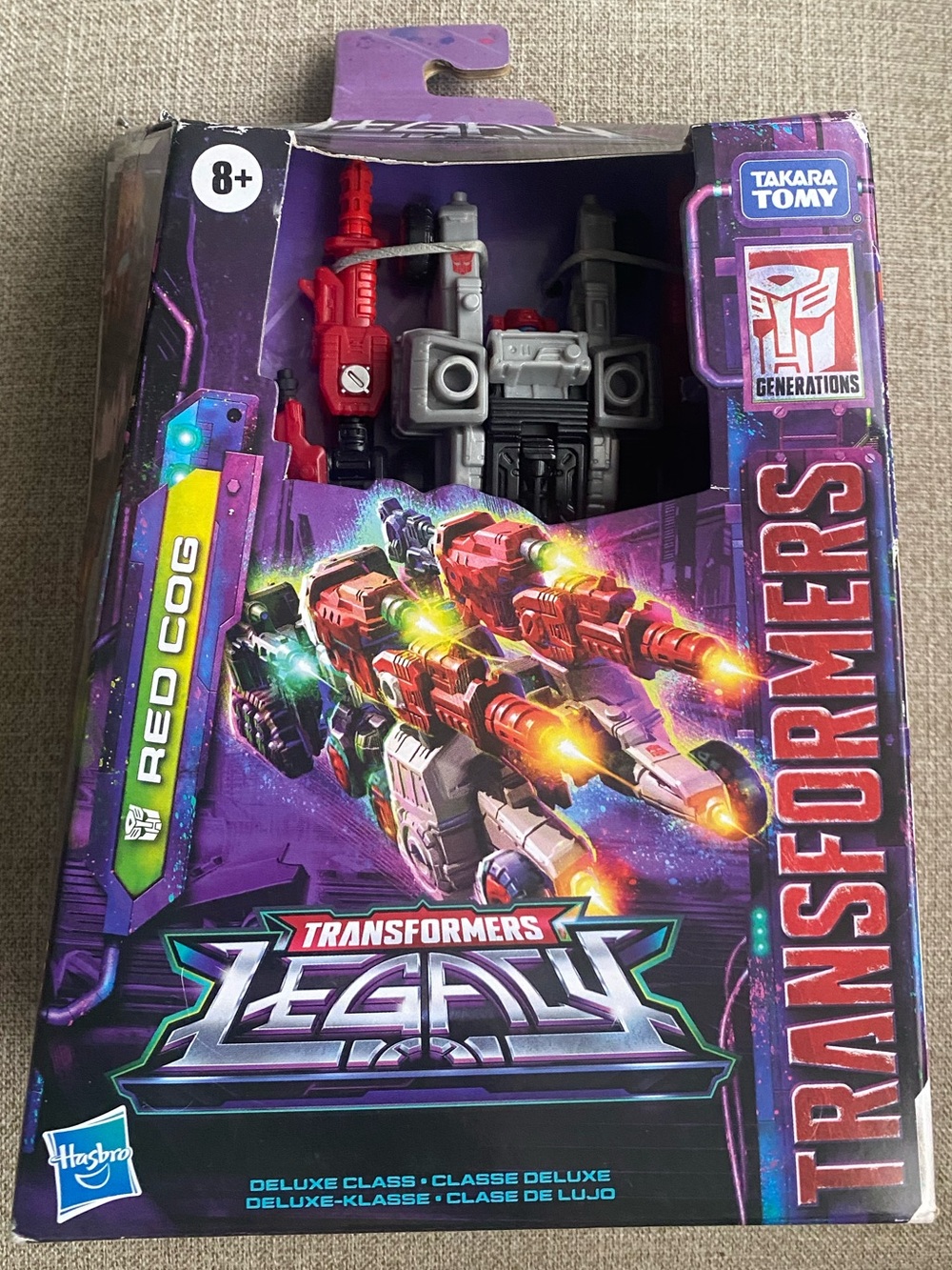 Transformers Generations Legacy Deluxe Red Cog Special Edition "Weaponizer"  Toy